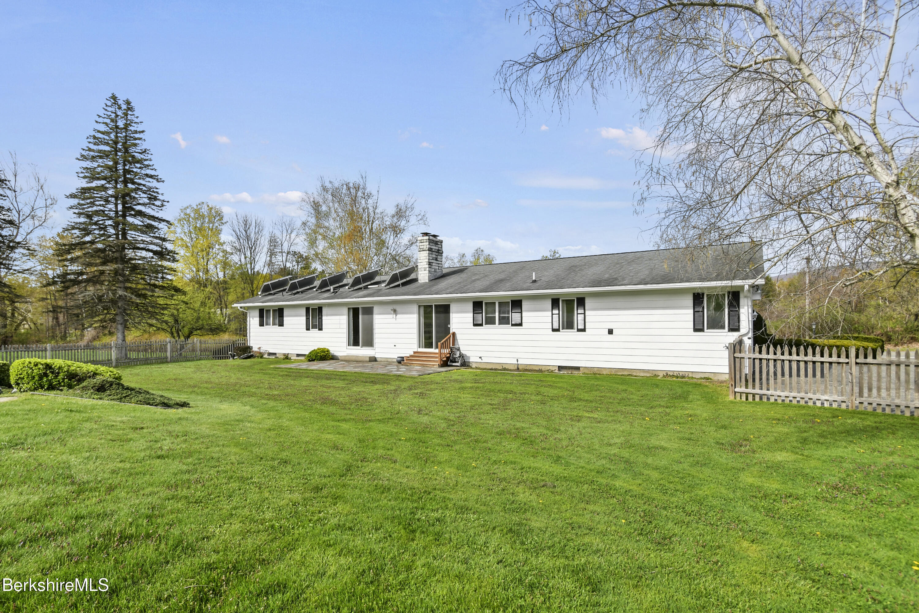 75 East Road Adams, MA 01220 - Photo 11 of 42 a front view of a house with a yard