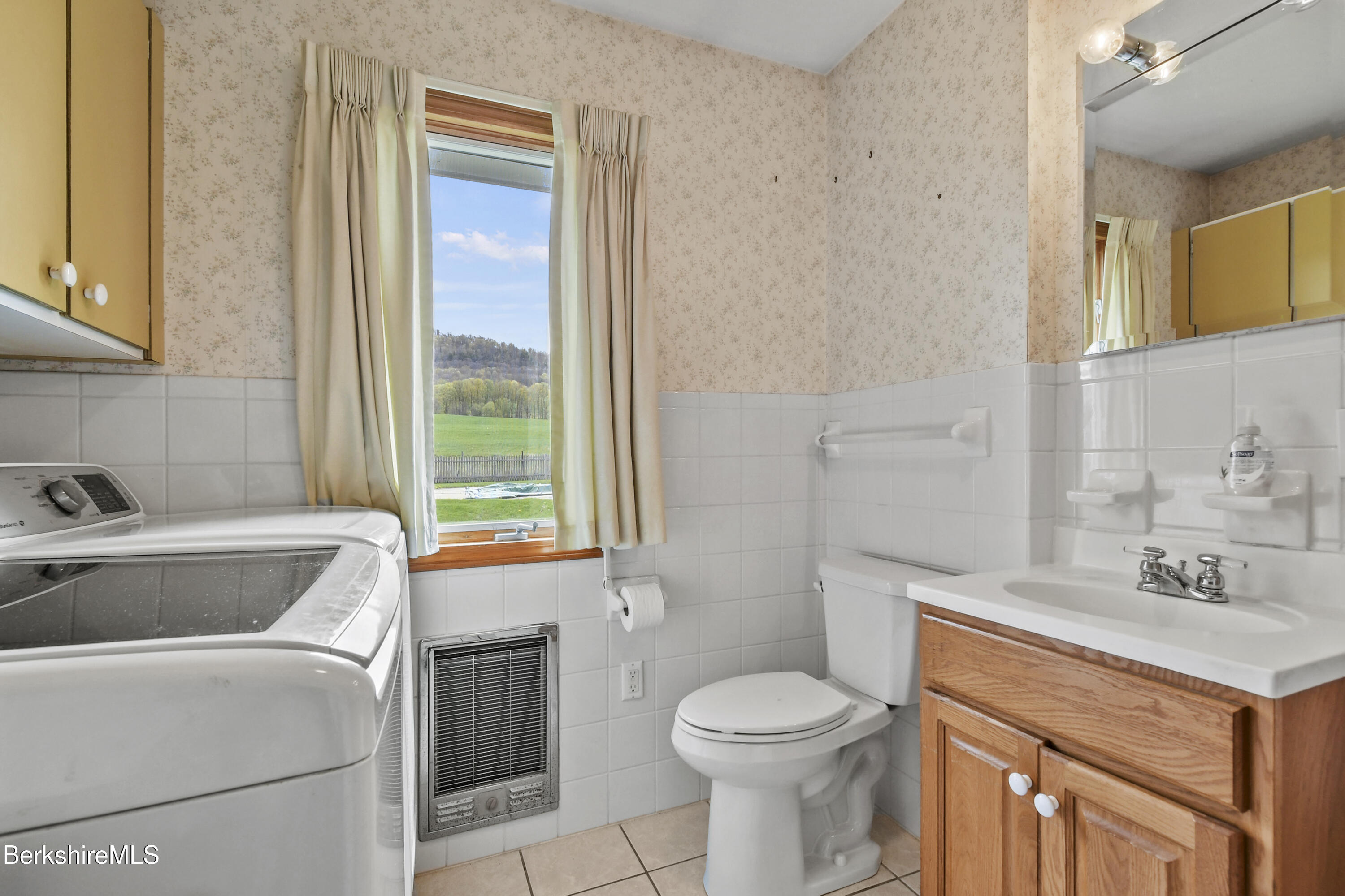 75 East Road Adams, MA 01220 - Photo 19 of 42 a bathroom with a sink a toilet and a bathtub