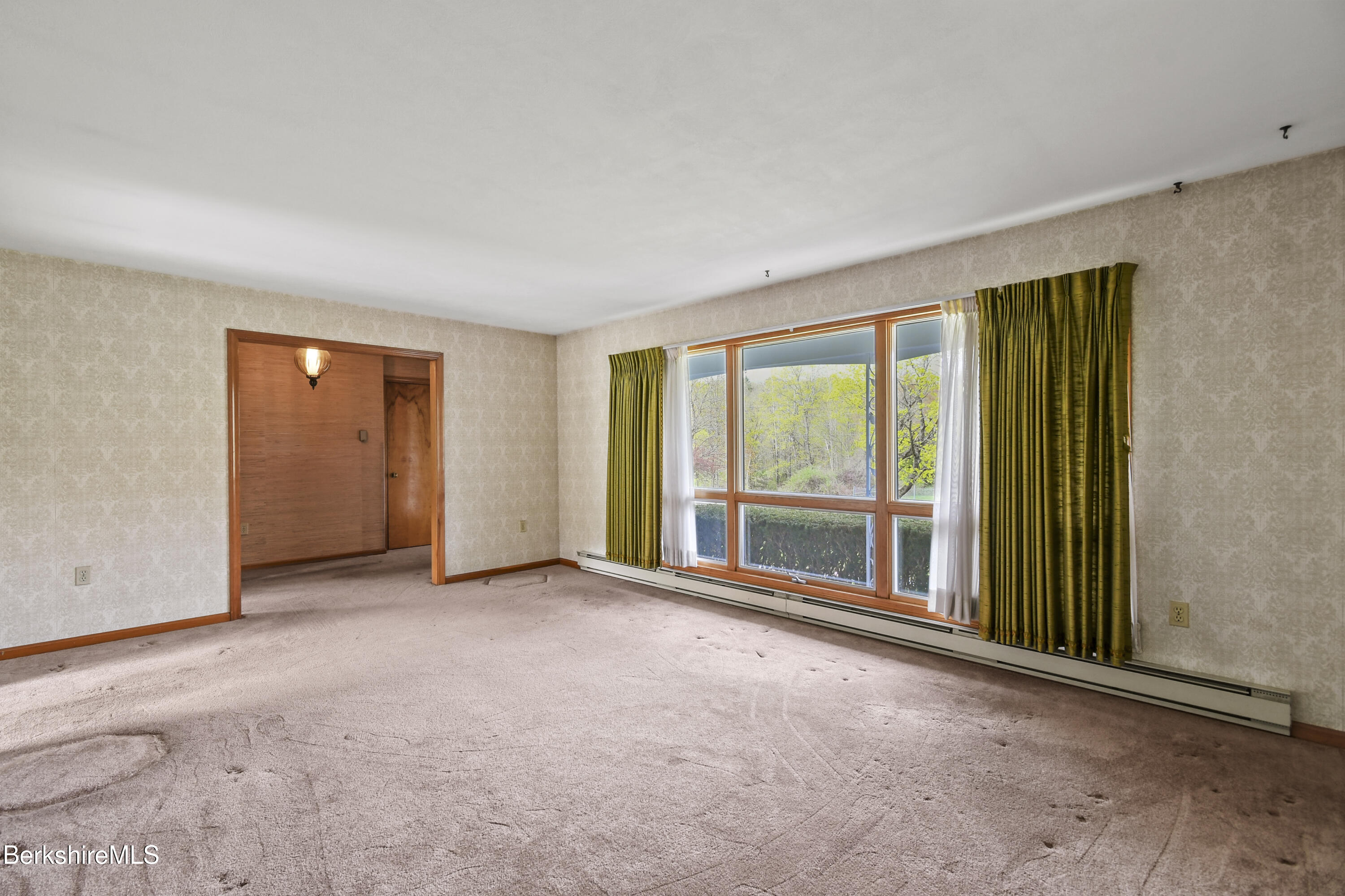 75 East Road Adams, MA 01220 - Photo 20 of 42 an empty room with windows