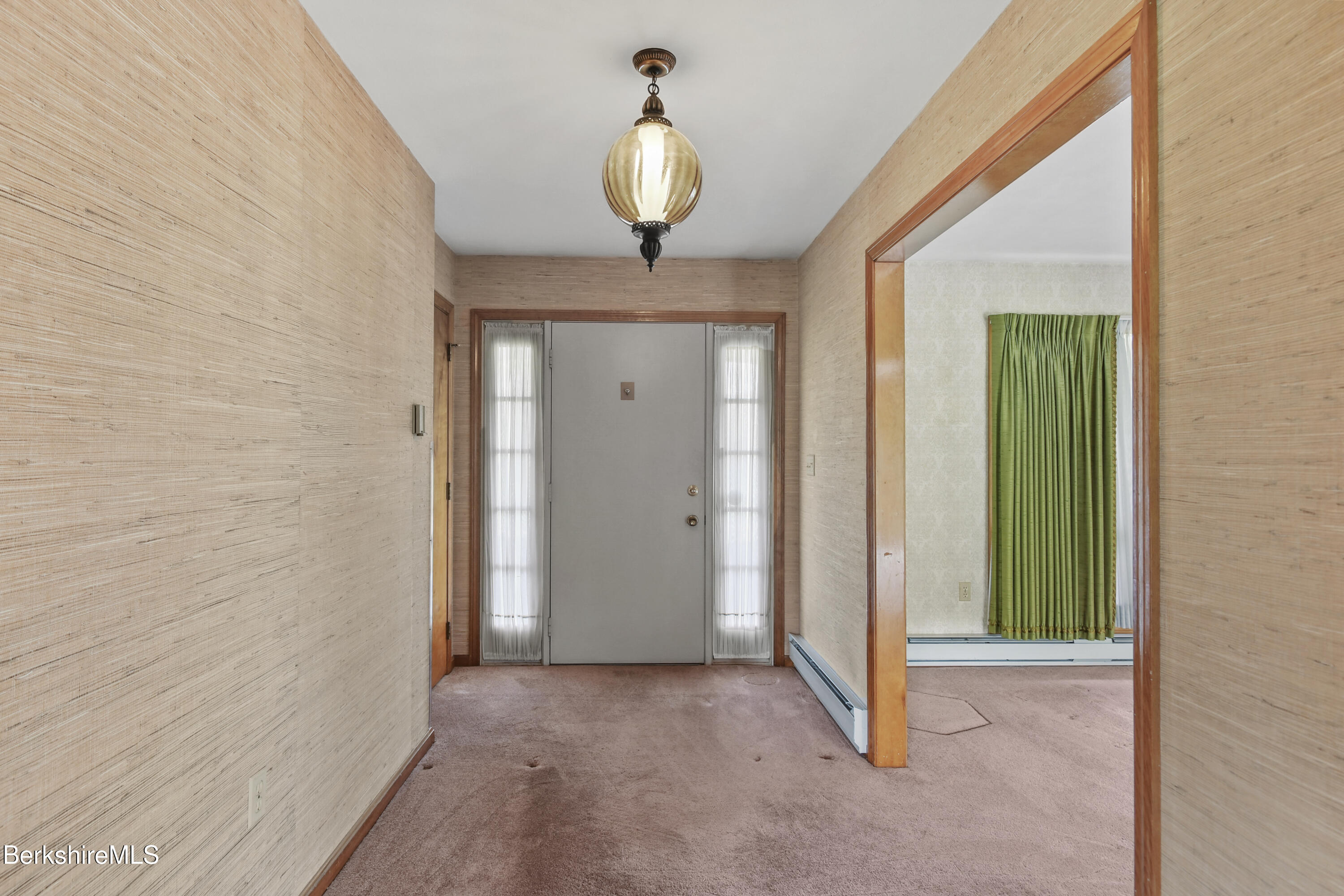 75 East Road Adams, MA 01220 - Photo 22 of 42 a view of a livingroom with a table and window