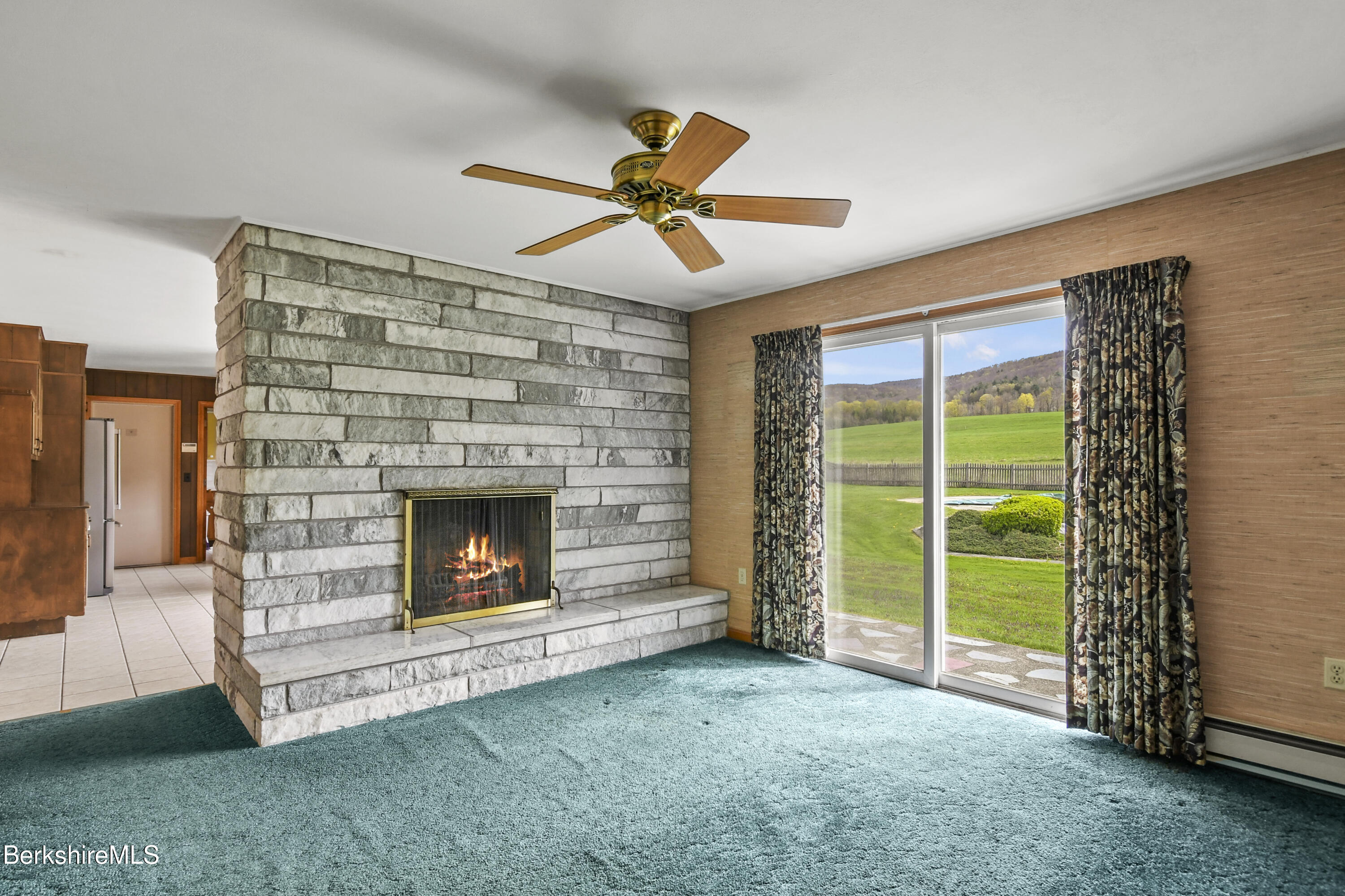 75 East Road Adams, MA 01220 - Photo 24 of 42 a living room with furniture and a fireplace