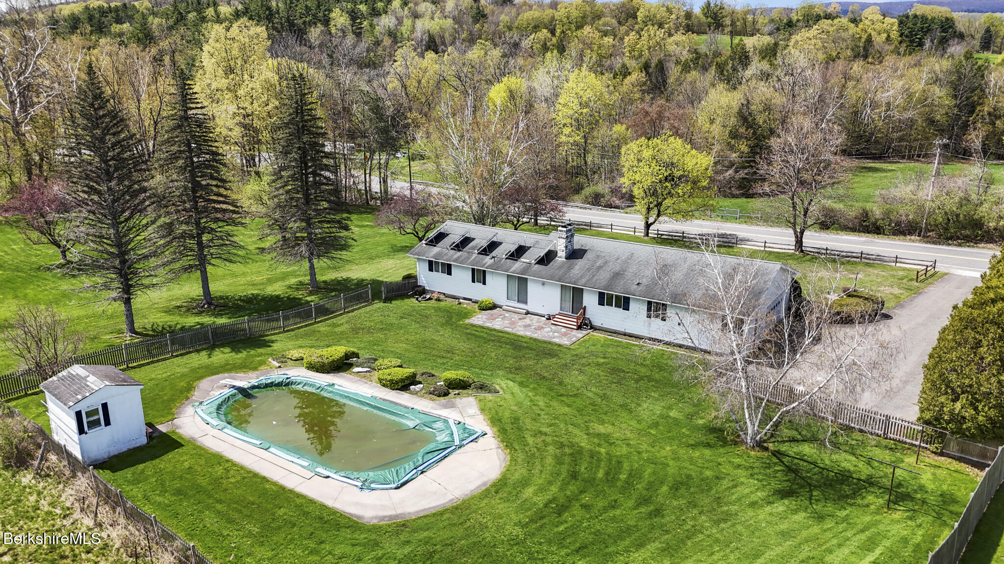 75 East Road Adams, MA 01220 - Photo 3 of 42 an aerial view of a house with garden space and trees