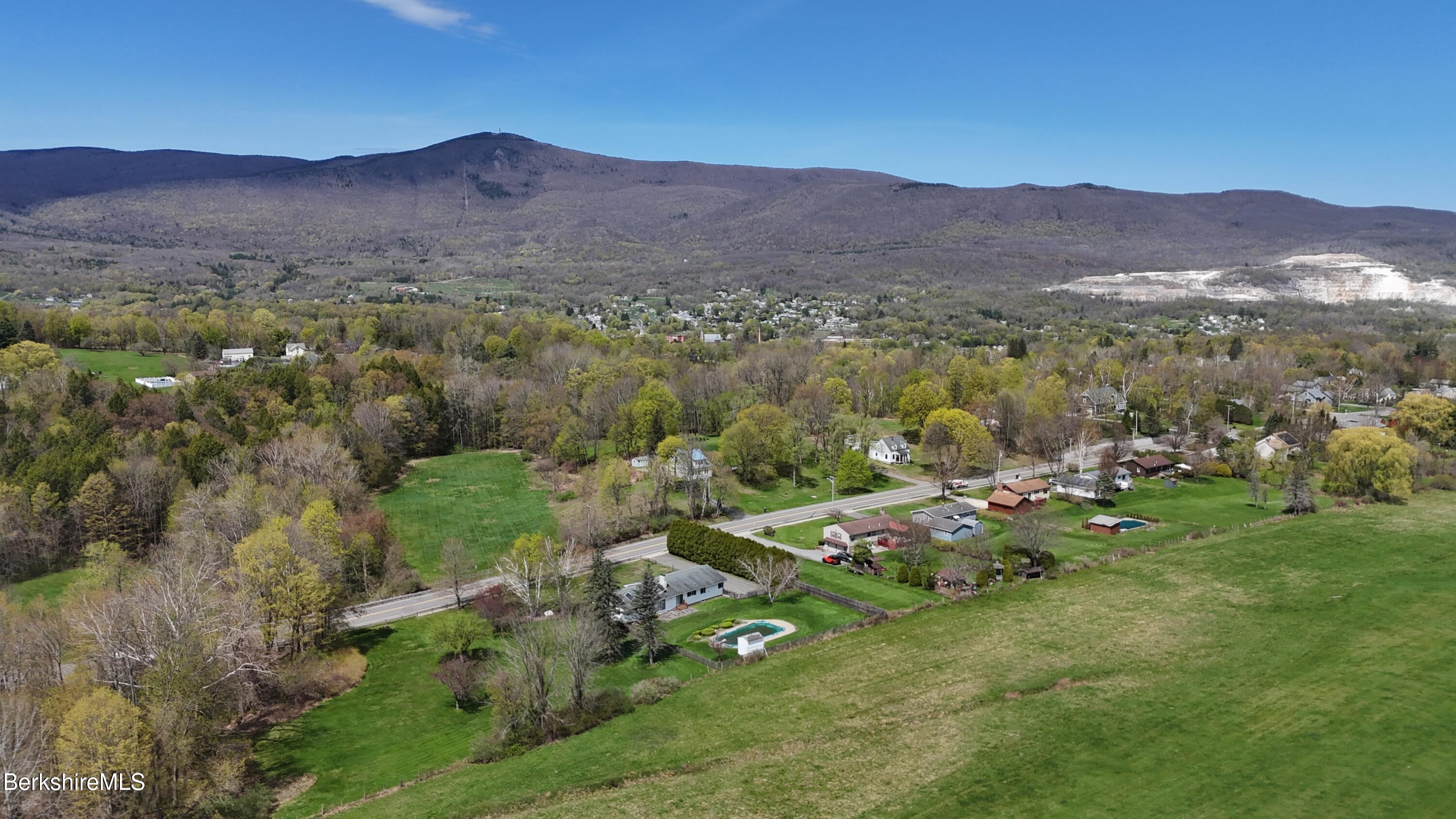 75 East Road Adams, MA 01220 - Photo 41 of 42 a view of a lush green hillside and houses