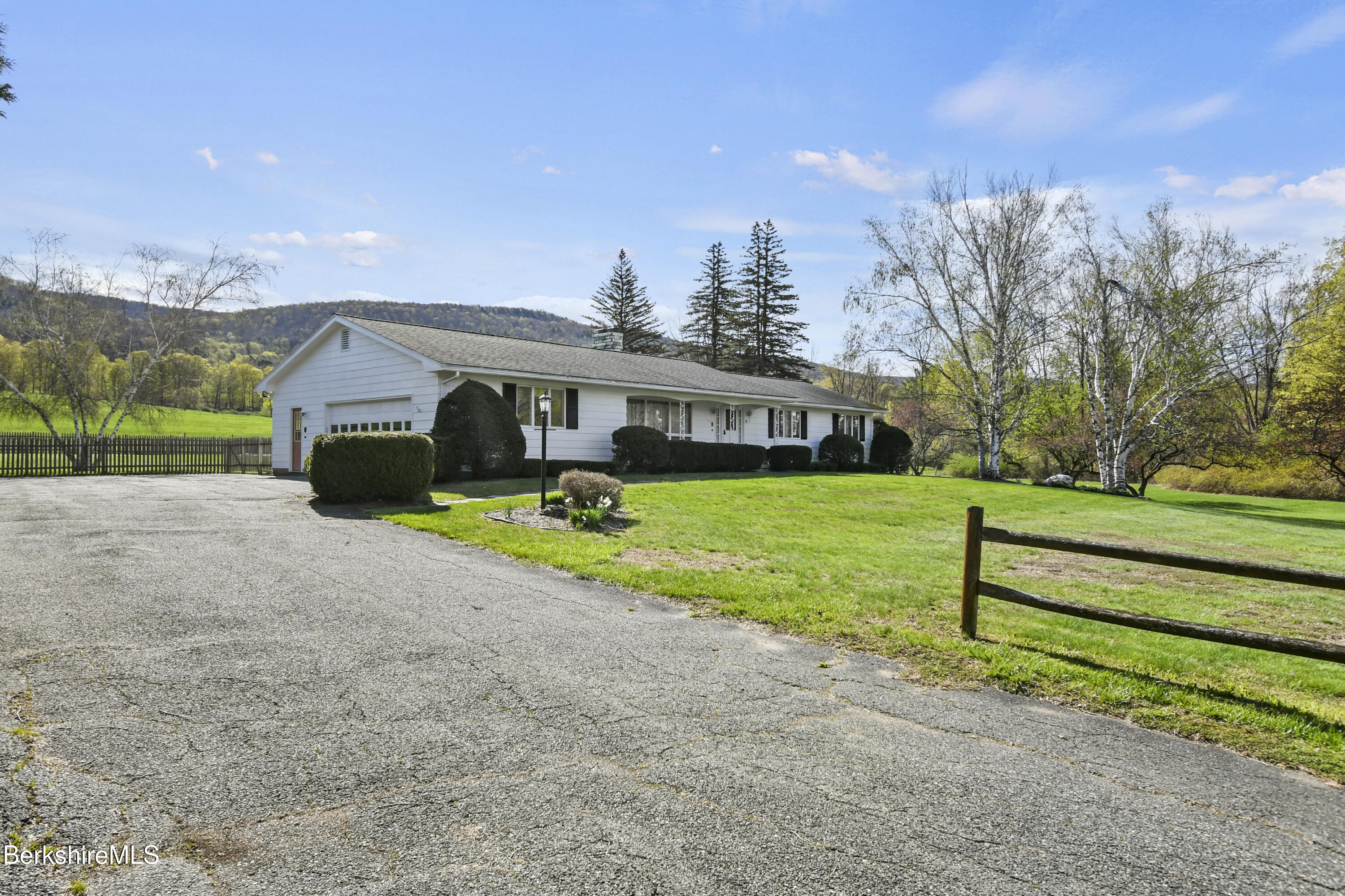 75 East Road Adams, MA 01220 - Photo 5 of 42 a front view of a house with garden