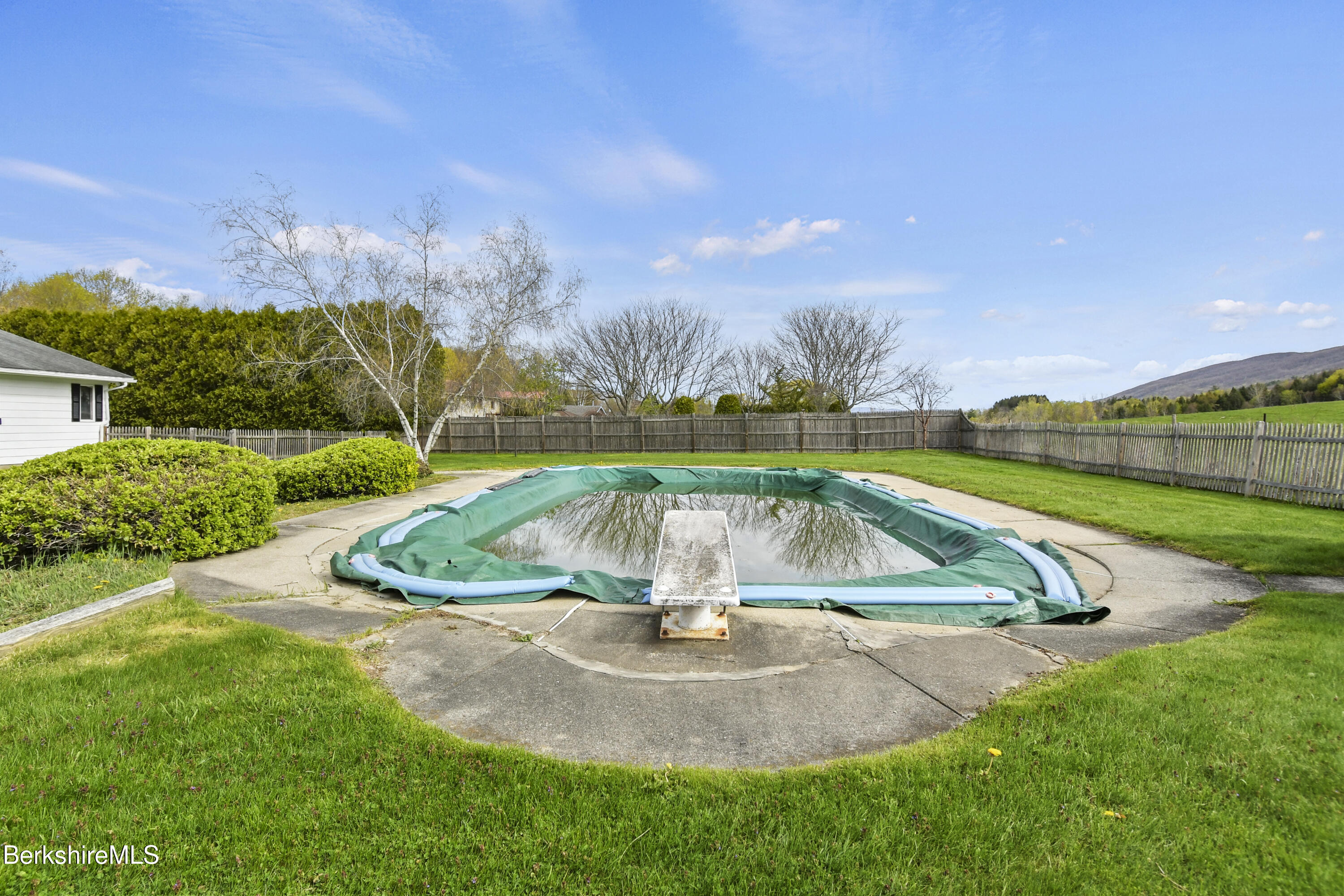 75 East Road Adams, MA 01220 - Photo 8 of 42 a view of a swimming pool with a yard