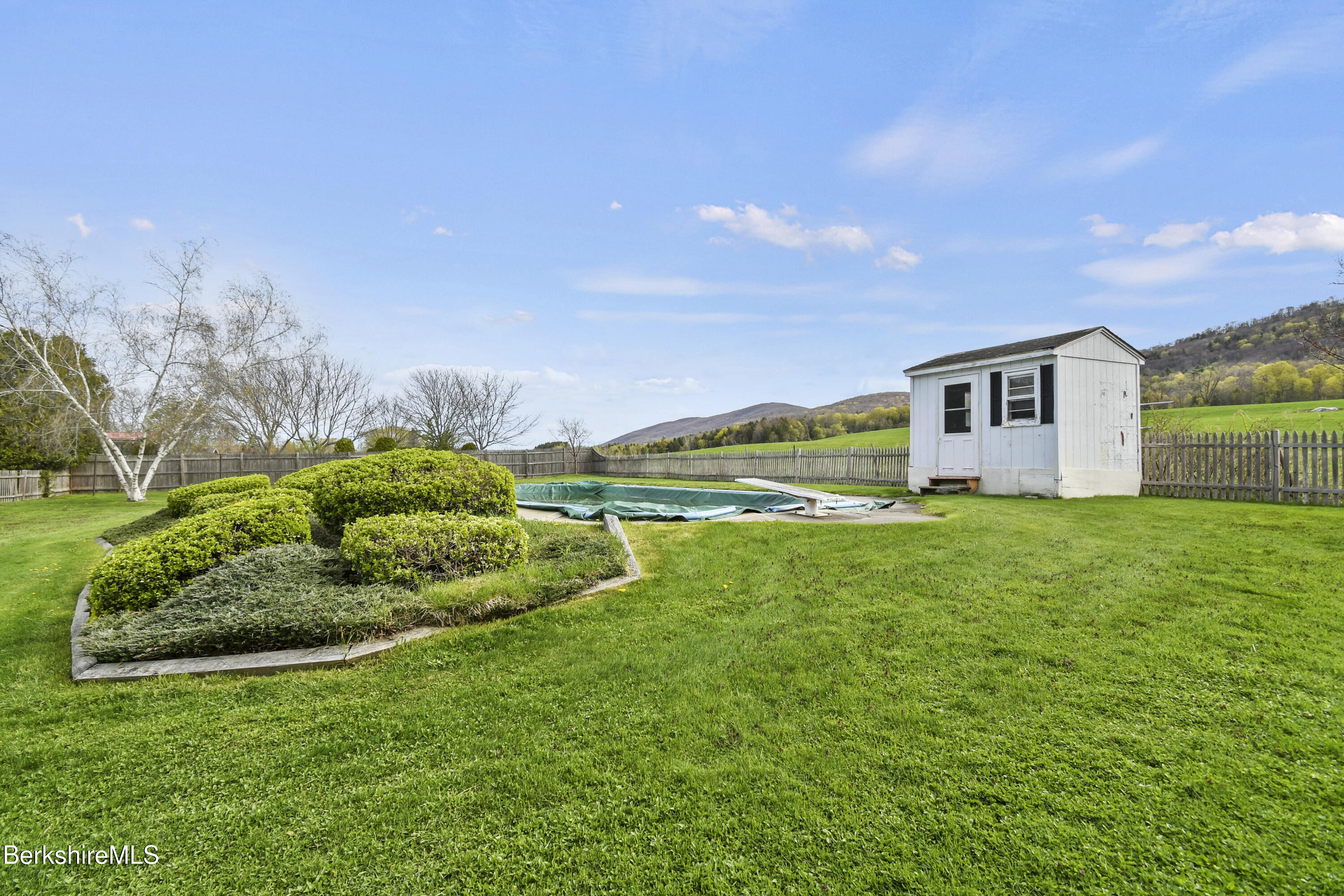 75 East Road Adams, MA 01220 - Photo 9 of 42 a front view of a house with a yard