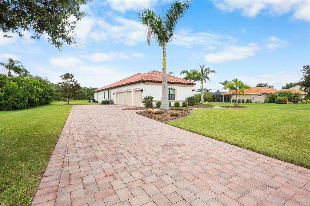 3511 Twin Rivers Trail Parrish, FL 34219 - Photo 4 of 43 a front view of a house with garden