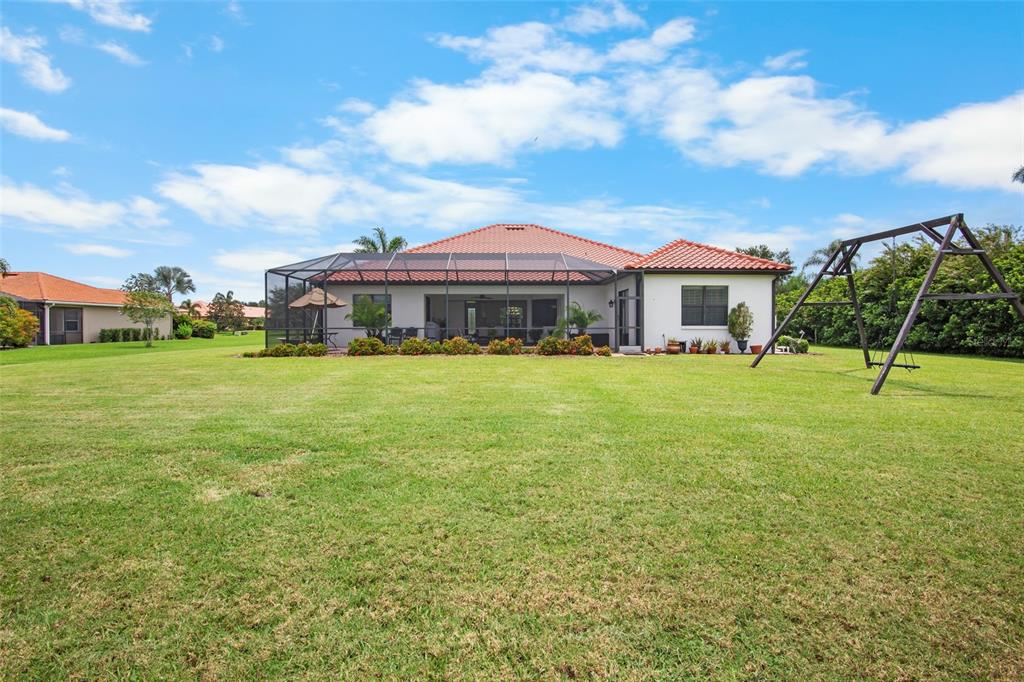 3511 Twin Rivers Trail Parrish, FL 34219 - Photo 41 of 43 a view of a house with a yard and sitting area