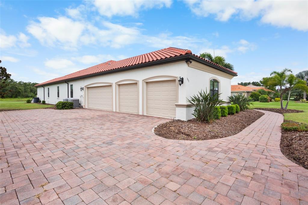 3511 Twin Rivers Trail Parrish, FL 34219 - Photo 5 of 43 a front view of a house with garden