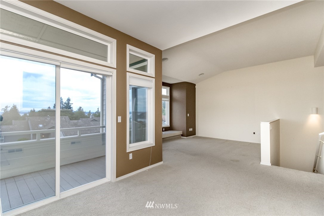 152 Cormorant Drive Steilacoom, WA 98388 - Photo 13 of 40 a view of a room with a large window