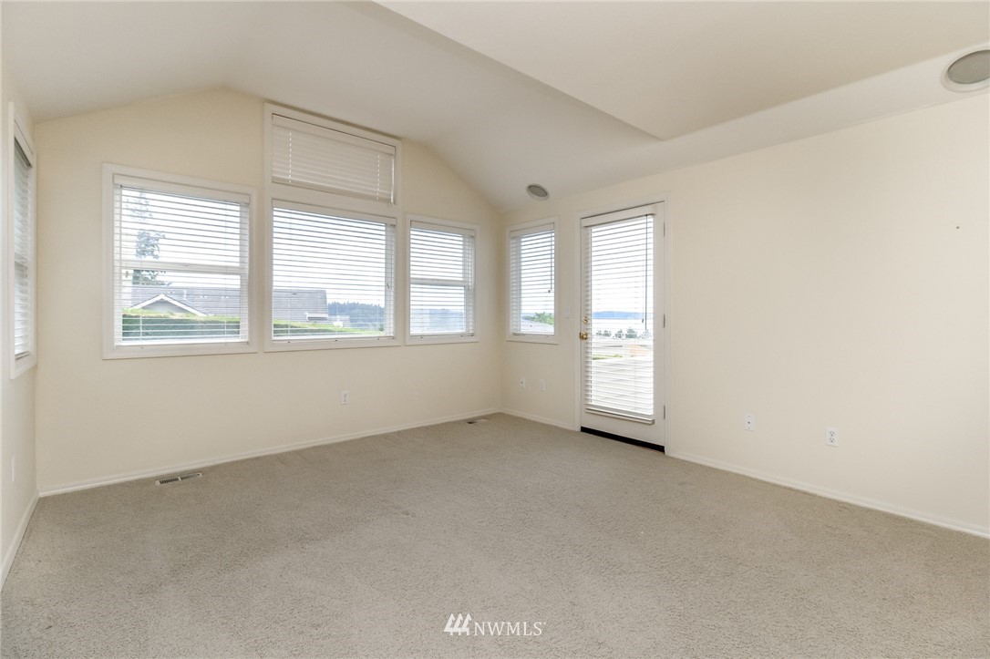 152 Cormorant Drive Steilacoom, WA 98388 - Photo 25 of 40 an empty room with windows