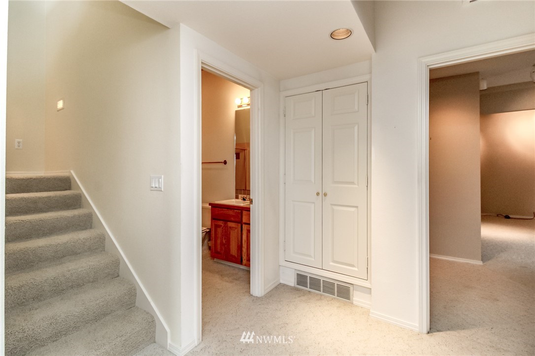 152 Cormorant Drive Steilacoom, WA 98388 - Photo 30 of 40 a view of entryway with wooden floor and door