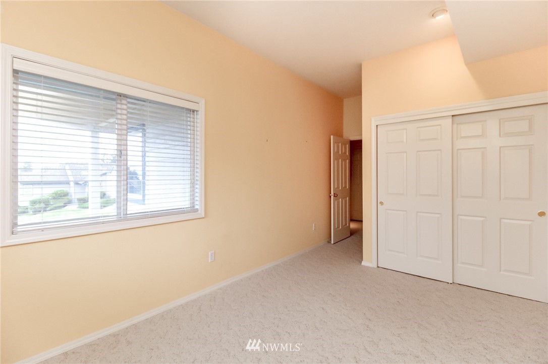 152 Cormorant Drive Steilacoom, WA 98388 - Photo 34 of 40 a view of an empty room with a window