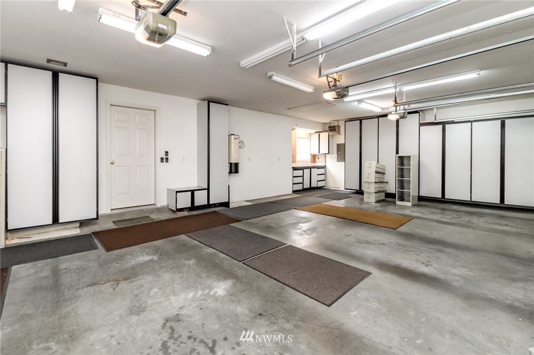 152 Cormorant Drive Steilacoom, WA 98388 - Photo 40 of 40 a view of a livingroom with furniture and a chandelier