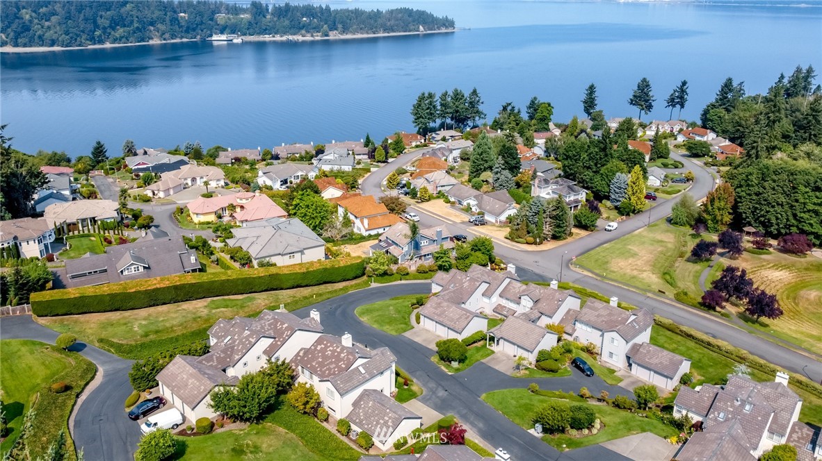 152 Cormorant Drive Steilacoom, WA 98388 - Photo 5 of 40 an aerial view of a house with a lake view