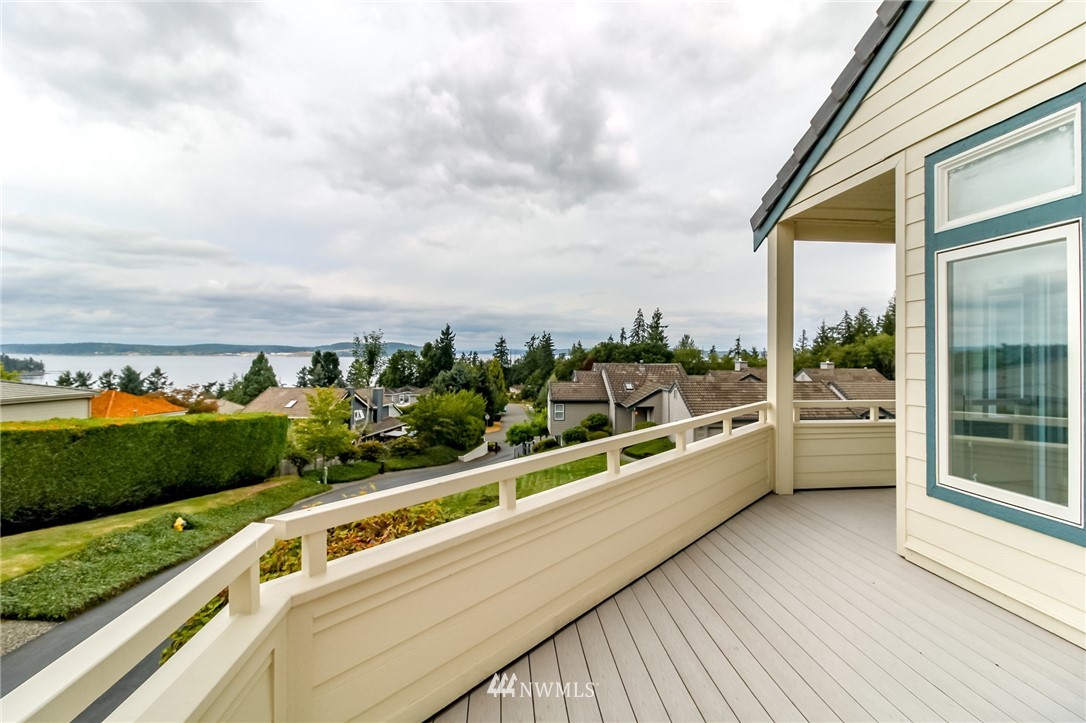 152 Cormorant Drive Steilacoom, WA 98388 - Photo 6 of 40 a view of balcony with furniture and garden
