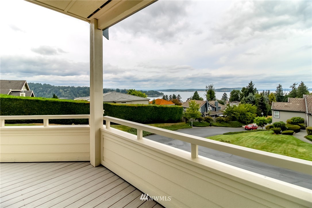 152 Cormorant Drive Steilacoom, WA 98388 - Photo 7 of 40 a view of a porch with furniture and city view