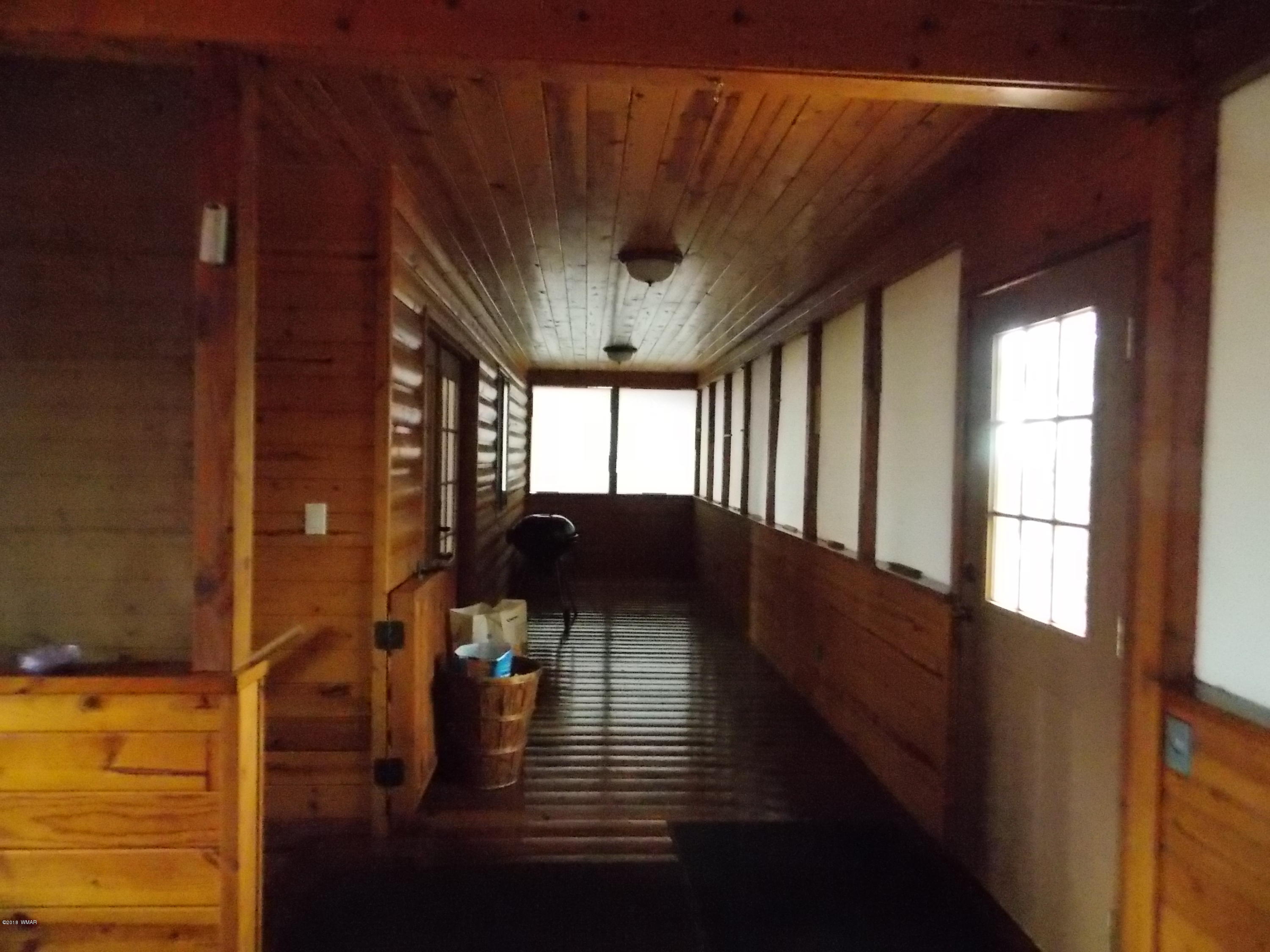 2296 Sunrise Road Overgaard, AZ 85933 - Photo 27 of 66 a view of entryway and hall with wooden floor