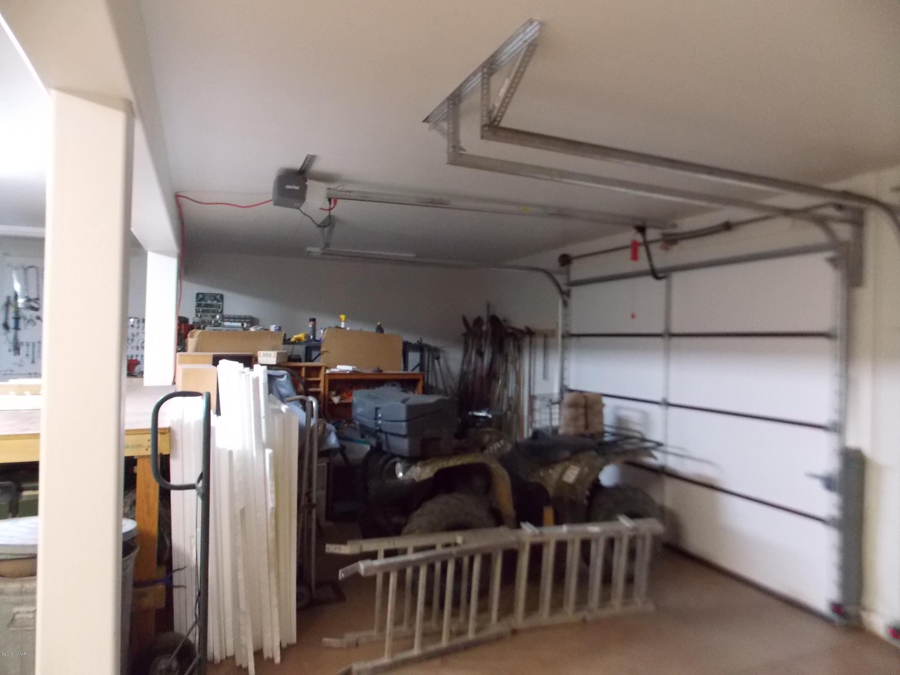 2296 Sunrise Road Overgaard, AZ 85933 - Photo 41 of 66 a view of storage and utility room