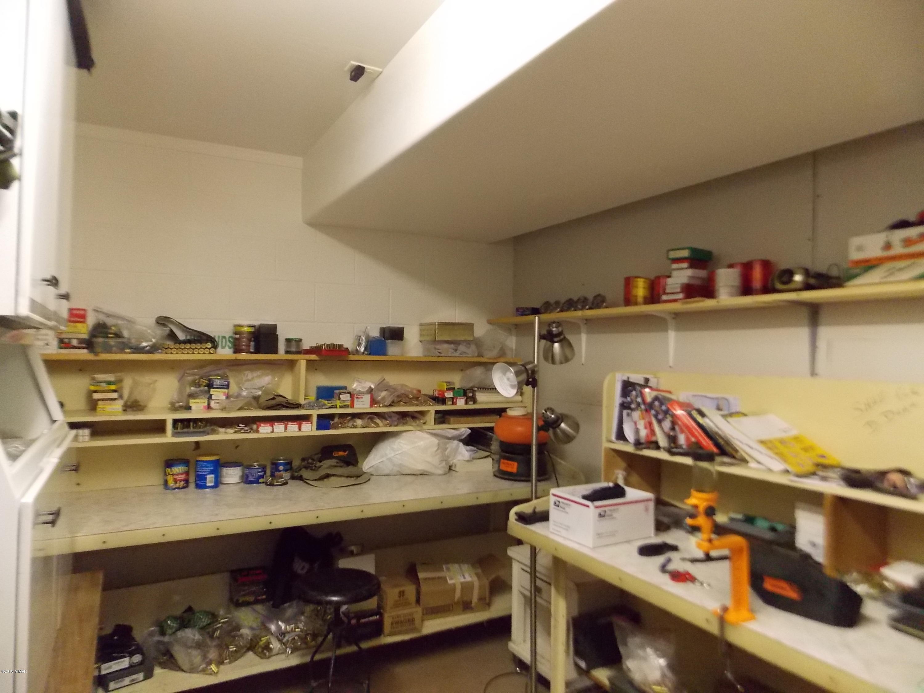 2296 Sunrise Road Overgaard, AZ 85933 - Photo 44 of 66 a room with storage and utility