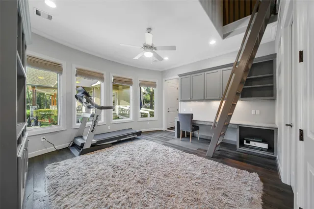a spacious bathroom with a granite countertop sink mirror and shower