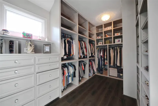 a living room with furniture tv and a fireplace