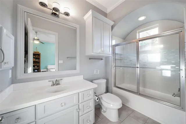 a view of a swimming pool with a patio and a yard