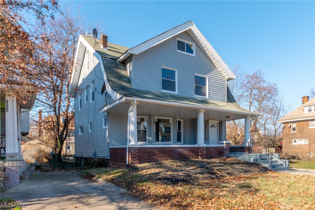 1228 Melbourne Road Cleveland, OH 44112 - Photo 33 of 35 View of front facade featuring covered porch