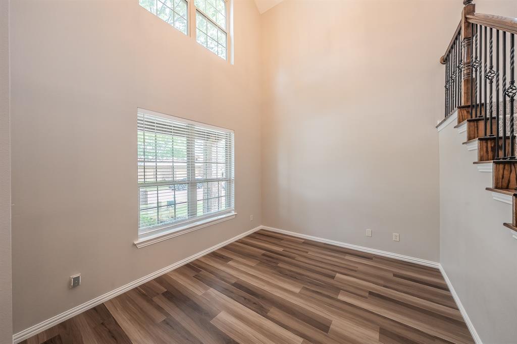 412 Hideaway Road McKinney, TX 75072 - Photo 4 of 40 an empty room with windows
