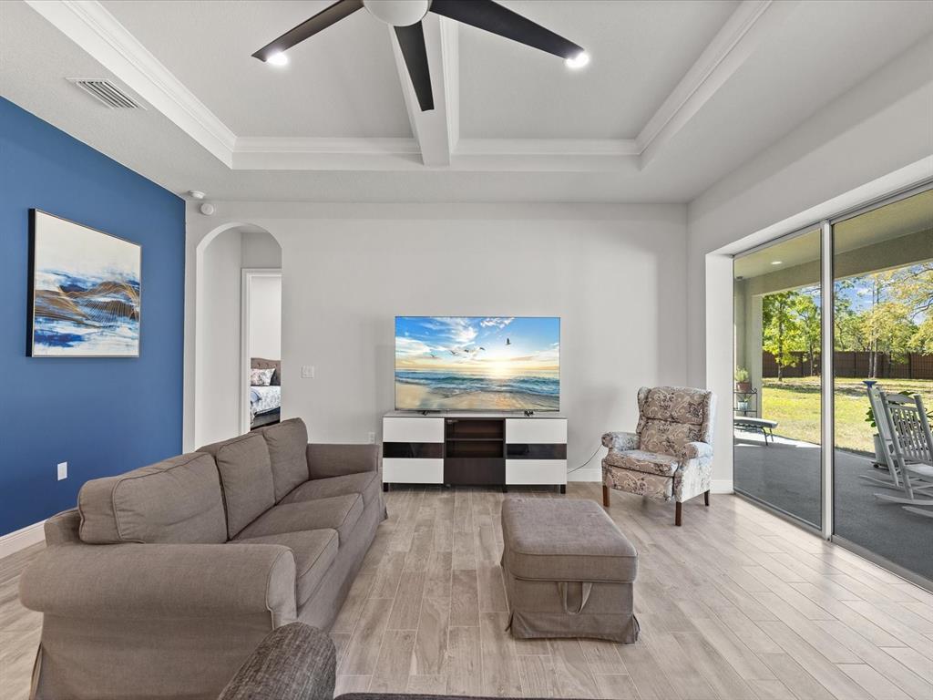 11981 Robina Road Weeki Wachee, FL 34614 - Photo 7 of 93 a living room with furniture and a large window