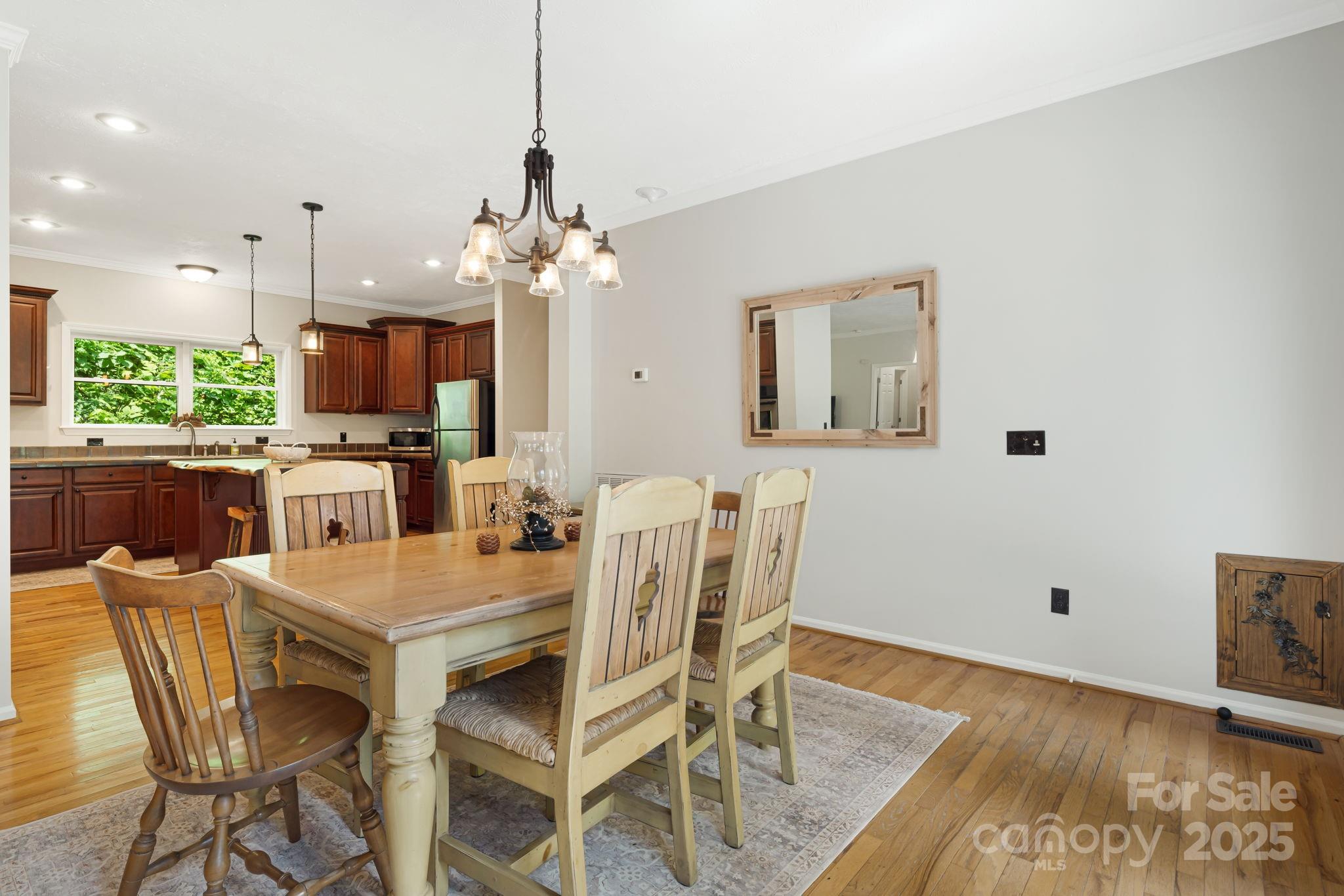 28 Back Stage Pass Leicester, NC 28748 - Photo 15 of 48 a view of a dining room with furniture window and wooden floor