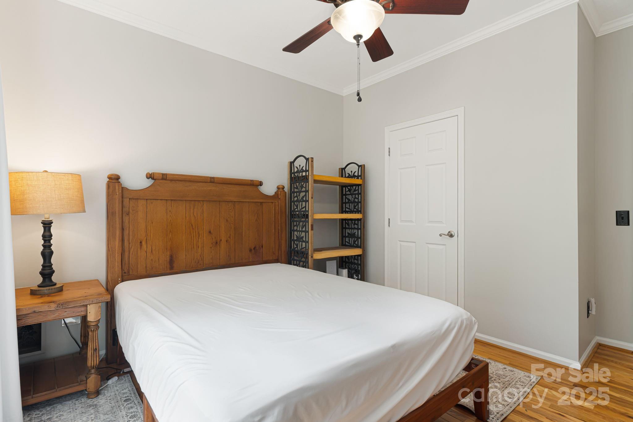 28 Back Stage Pass Leicester, NC 28748 - Photo 27 of 48 a bedroom with a bed and a lamp