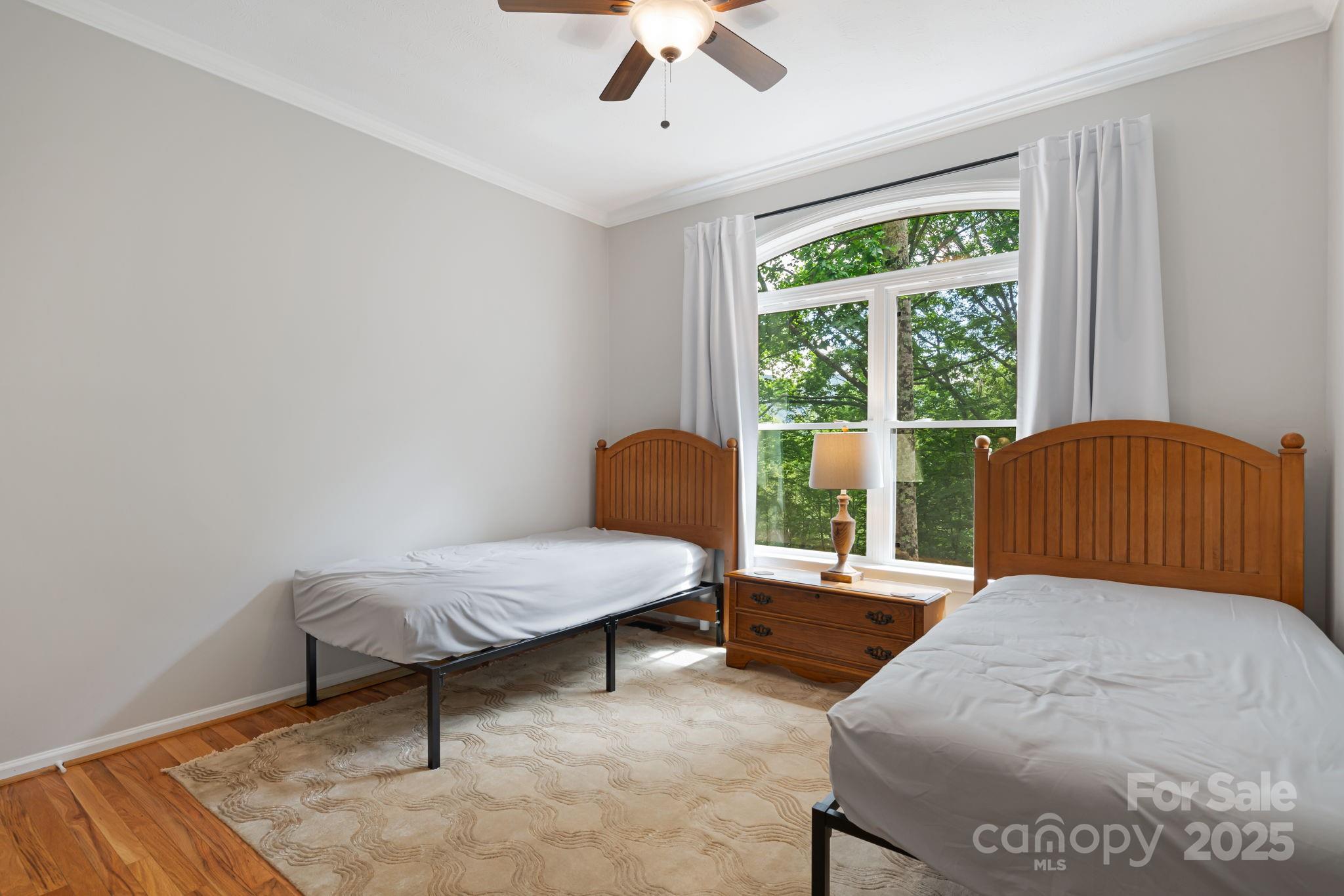 28 Back Stage Pass Leicester, NC 28748 - Photo 28 of 48 a bedroom with a bed and a window