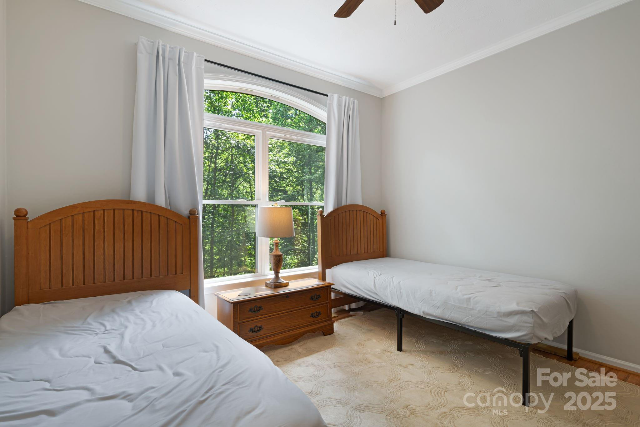 28 Back Stage Pass Leicester, NC 28748 - Photo 29 of 48 a bedroom with a bed chair and a window