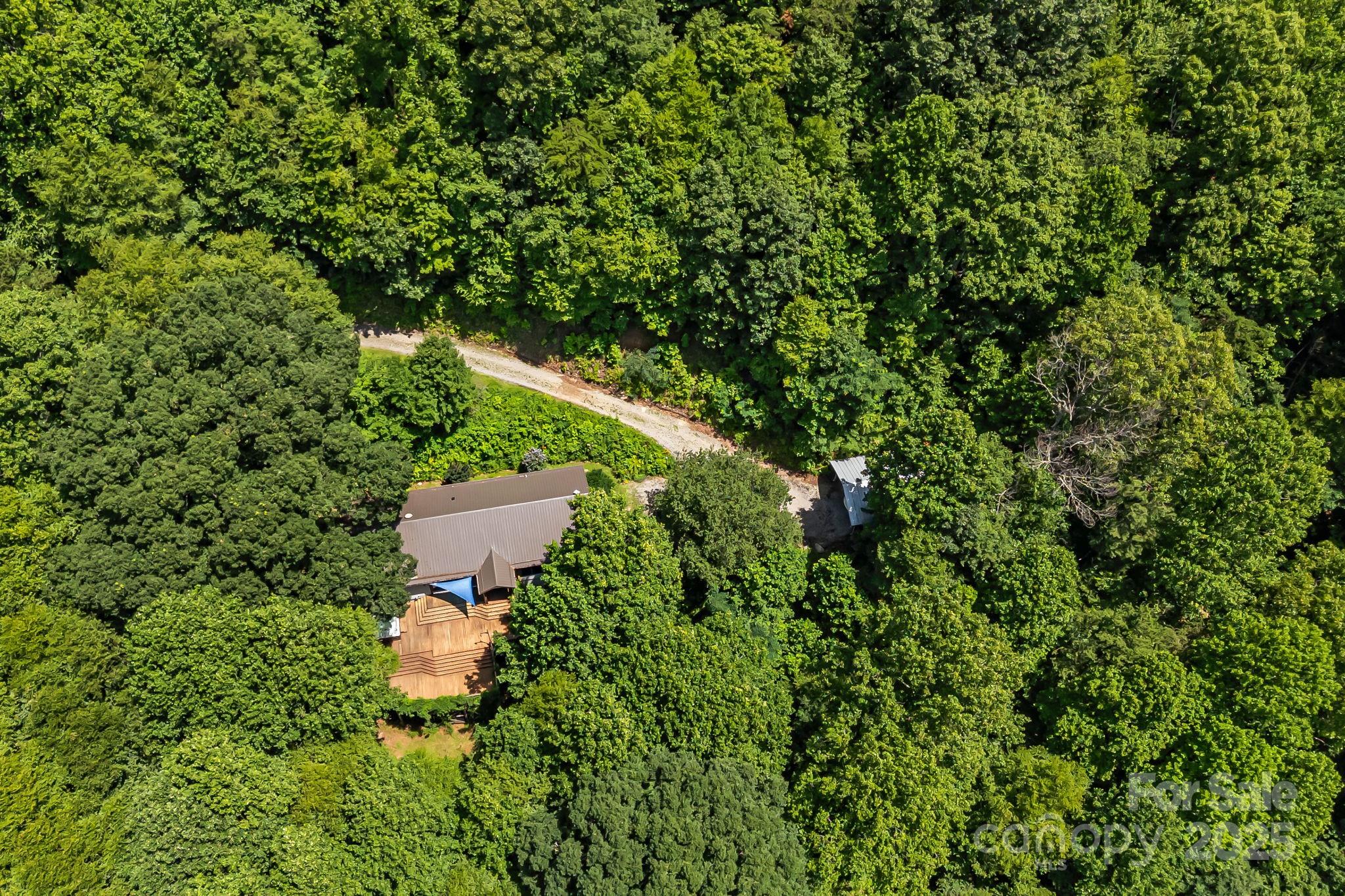 28 Back Stage Pass Leicester, NC 28748 - Photo 40 of 48 an aerial view of a house with a yard and outdoor seating