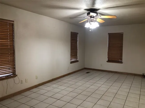 a view of an empty room with window
