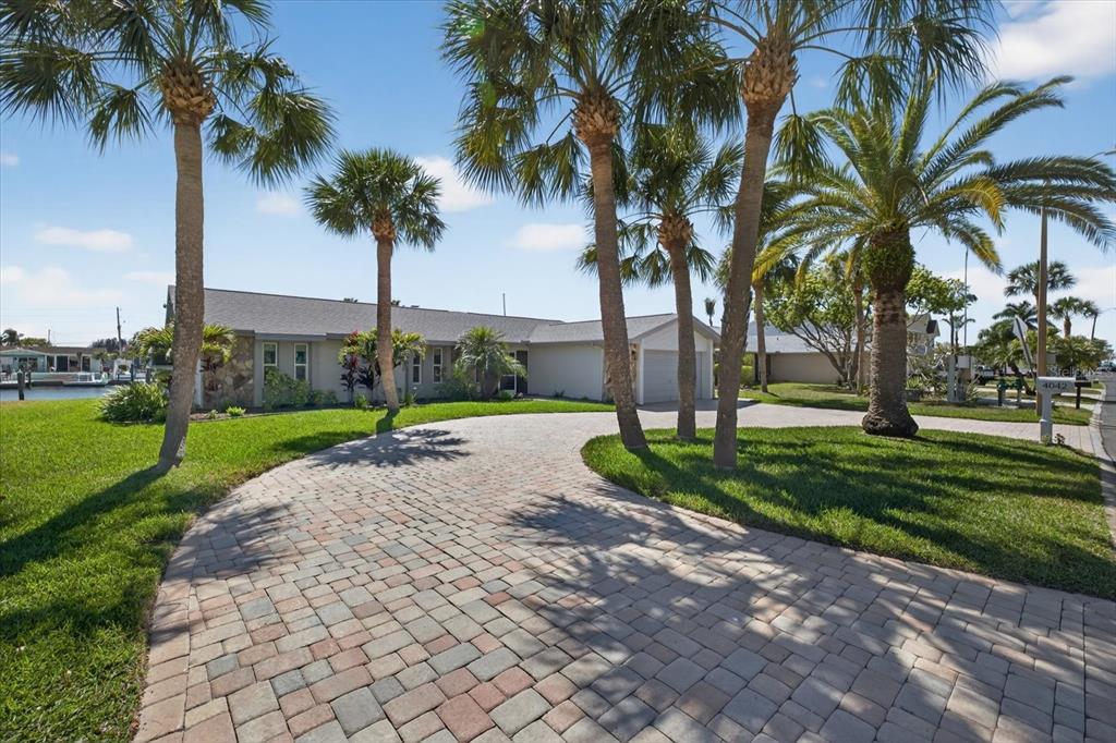 4042 Perry Place New Port Richey, FL 34652 - Photo 1 of 1 a view of a park with palm trees