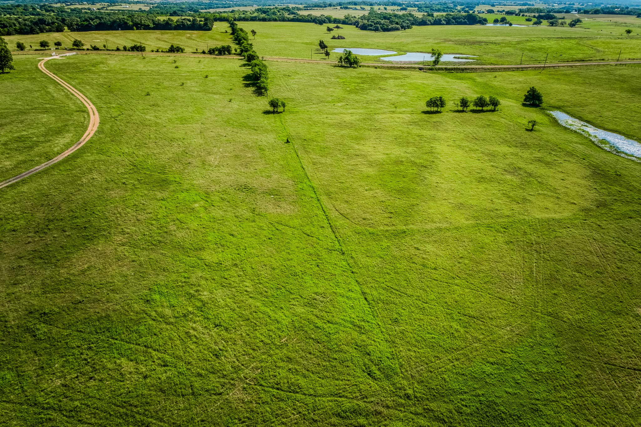 5005 Fuchs Road Burton, TX 77835 - Photo 7 of 7 a view of a field with an ocean
