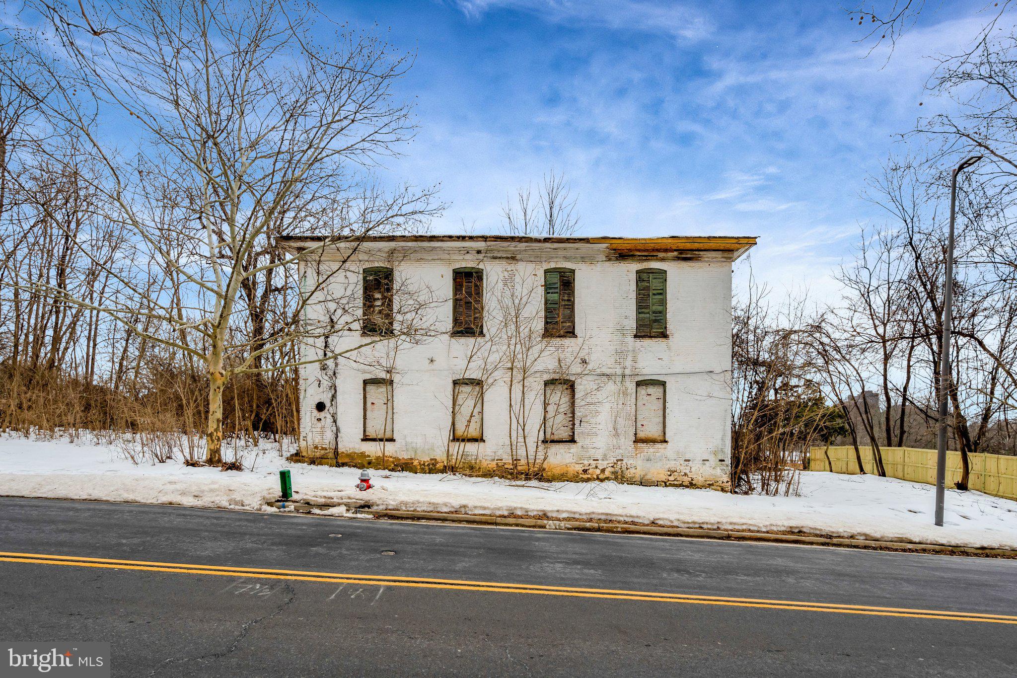 1865 Old Reston Avenue Reston, VA 20190 - Photo 4 of 5 a front view of a house with a yard
