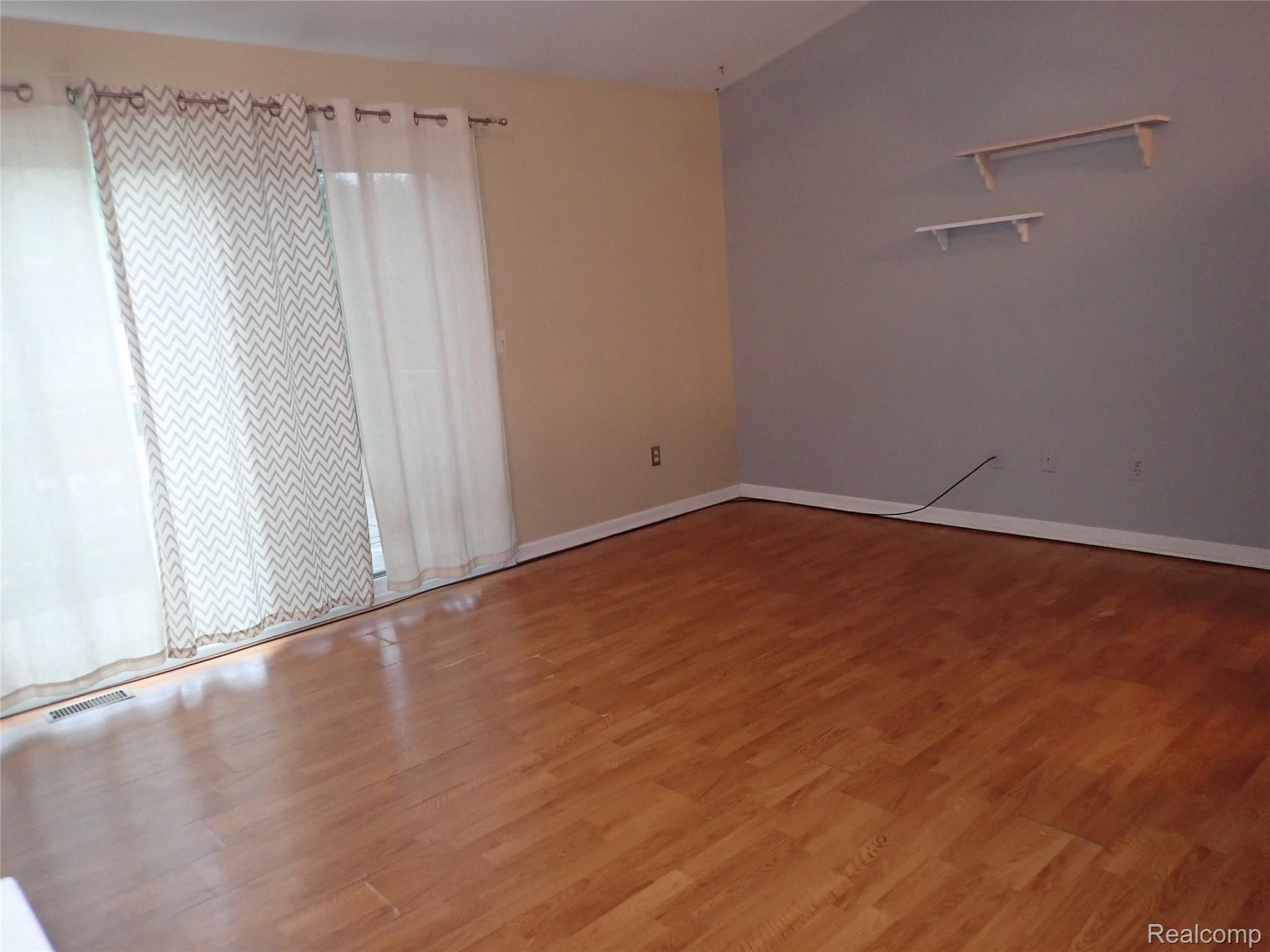 50 Pine Tree Ridge, Unit 4 Waterford, MI 48327 - Photo 4 of 25 Spacious living room.JPG