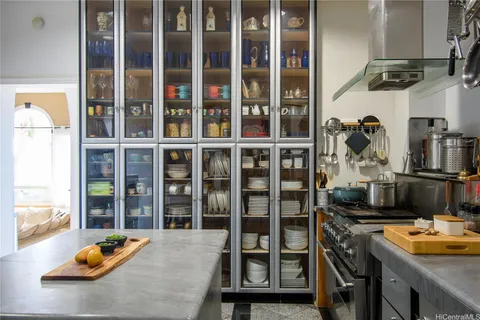 a dining room with furniture and a window