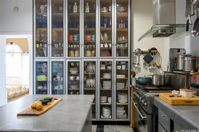 a dining room with furniture and a window