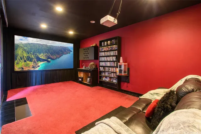 a living room with furniture pool and a flat screen tv