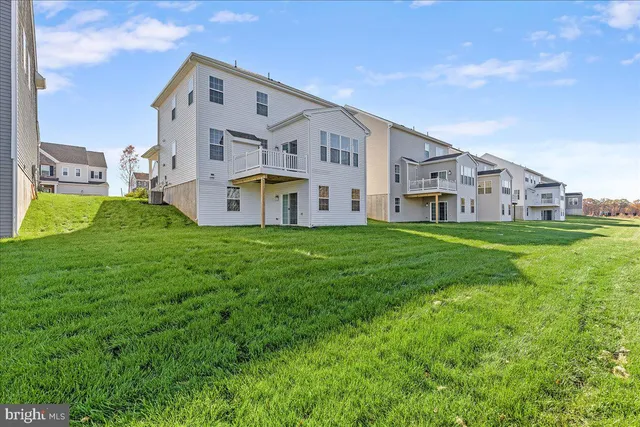 a view of a yard with swimming pool and outdoor space