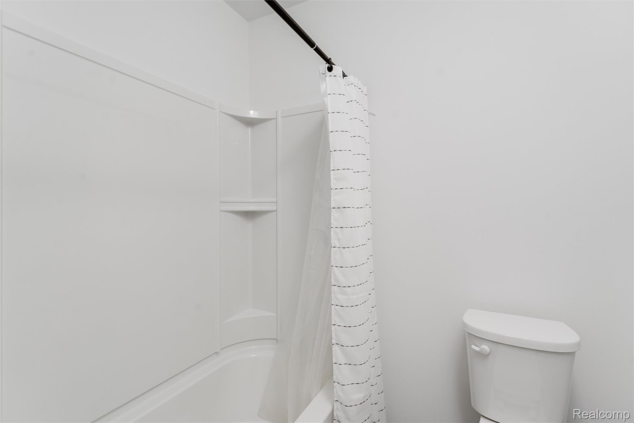 908 South Livernois Road Rochester, MI 48309 - Photo 34 of 49 Bathroom with shower / tub combo and toilet