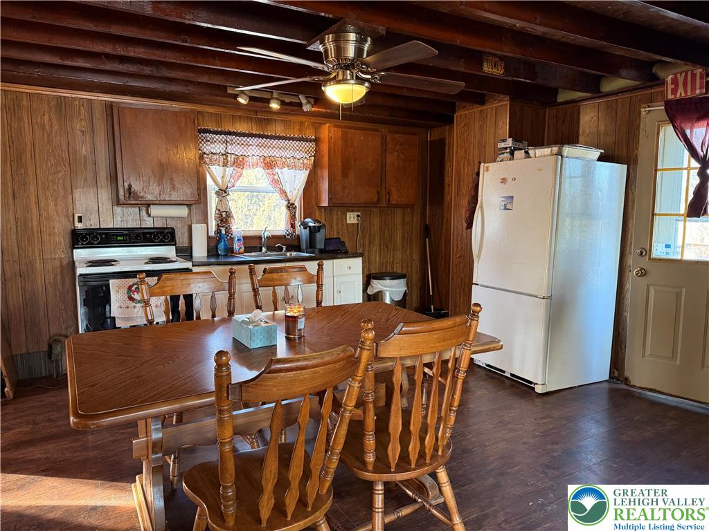 702 West Locker Street Nazareth, PA 18064 - Photo 2 of 12 a dining room with furniture a chandelier and wooden floor