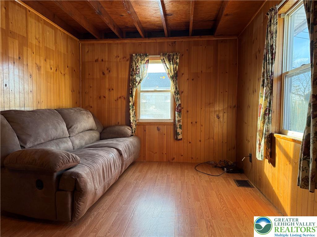 702 West Locker Street Nazareth, PA 18064 - Photo 3 of 12 a living room with a bed furniture and a window