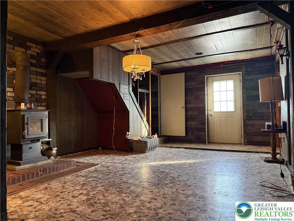 702 West Locker Street Nazareth, PA 18064 - Photo 8 of 12 a view of a livingroom with wooden floor and stairs