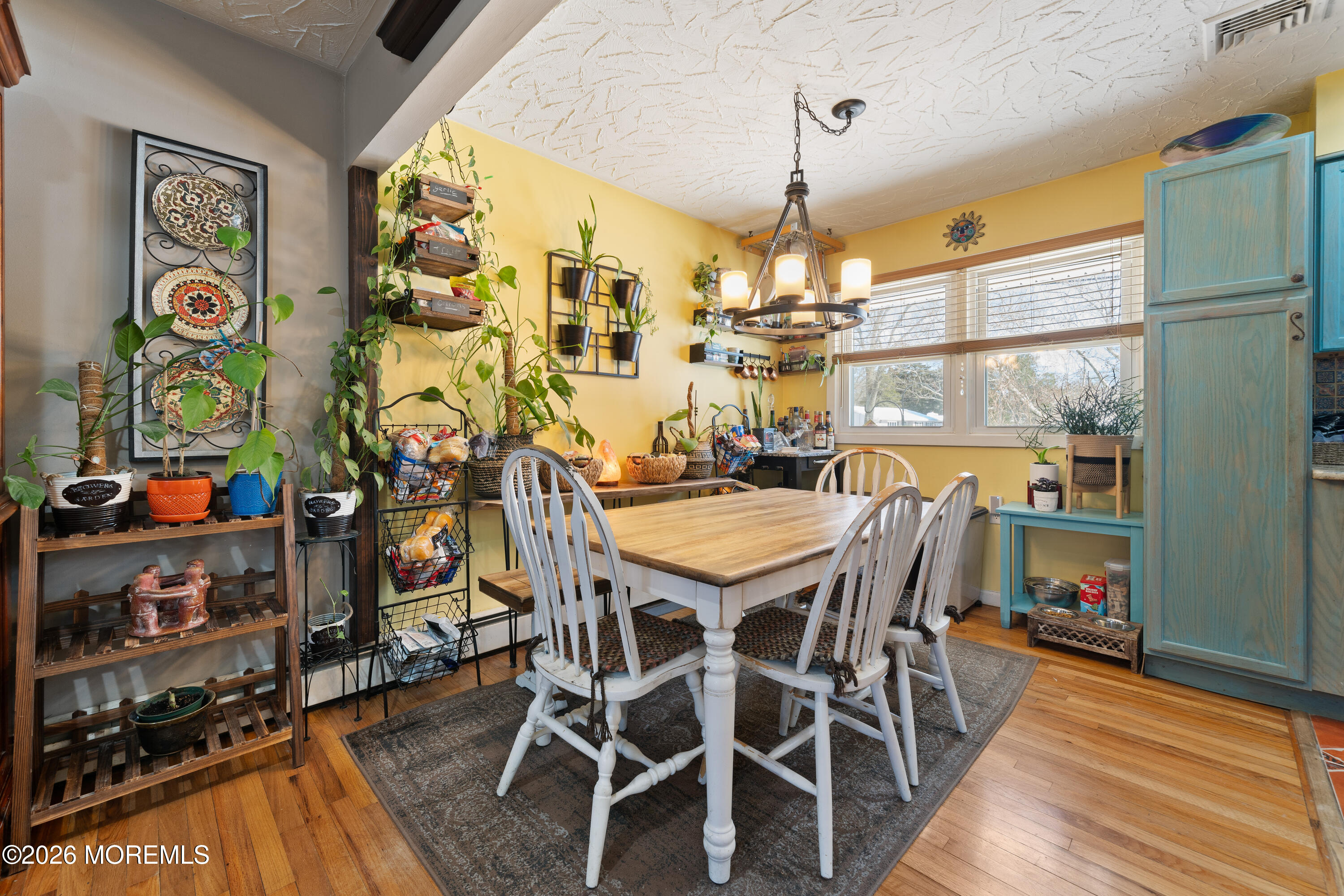 330 Riviera Drive Forked River, NJ 08731 - Photo 15 of 32 a view of a dining room with furniture and chandelier