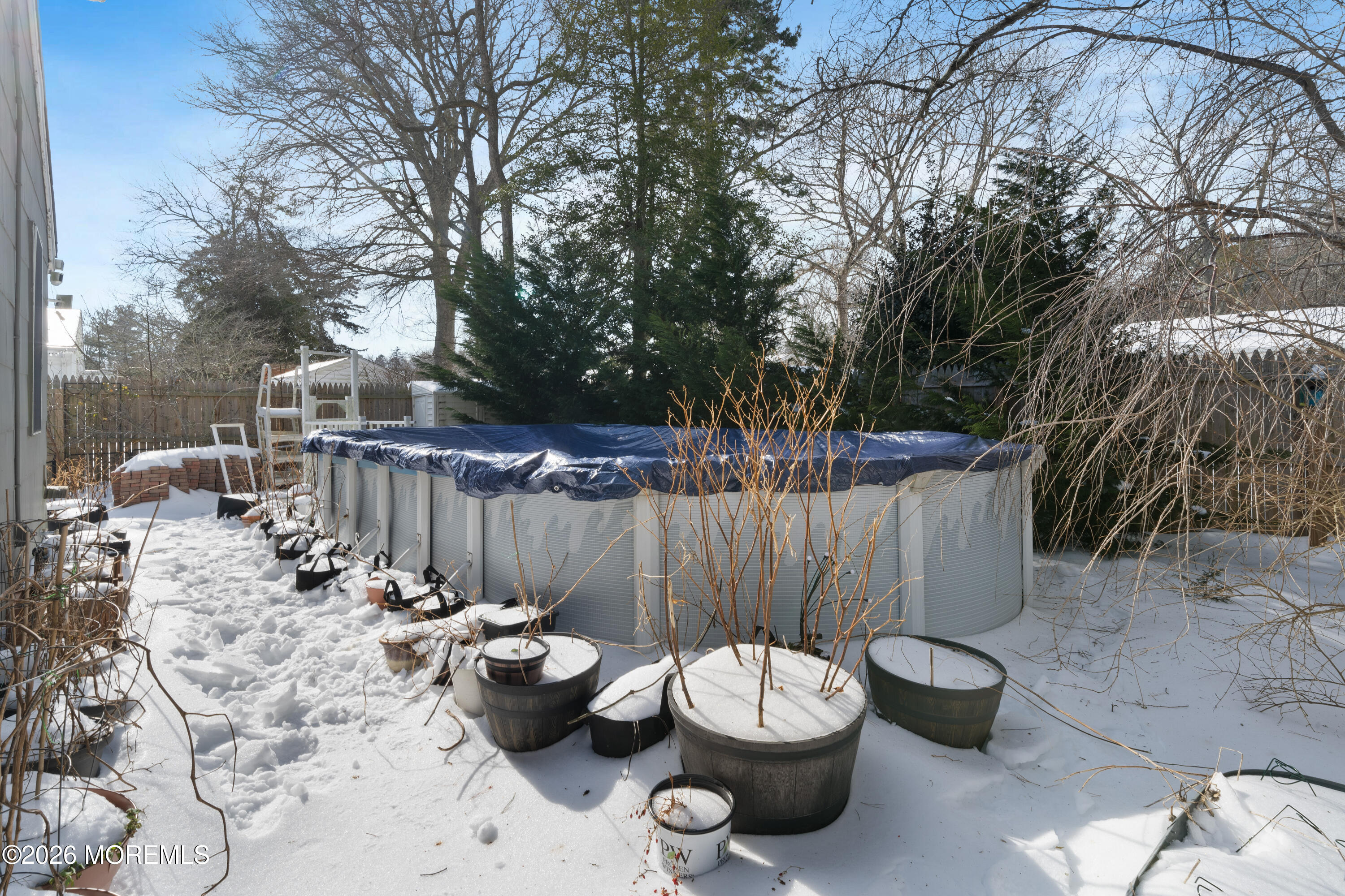 330 Riviera Drive Forked River, NJ 08731 - Photo 32 of 32 a view of a backyard with furniture and barbeque grill